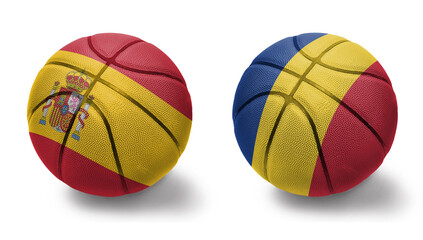 Obraz premium basketball balls with the national flags of romania and spain on the white background.
