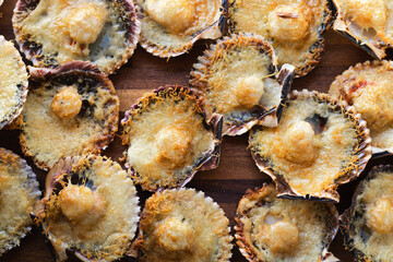 Conchitas a la parmesana parmesan scallops with grated parmesan cheese peruvian latin american food