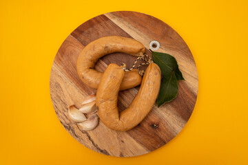 typical portuguese smoked sausage Farinheira on the wooden dish
