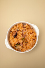 traditional portuguese dish rice with seafood in white dish