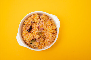traditional portuguese dish rice with seafood in white dish