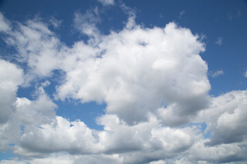 Background of summer clouds in a blue sky.Beautiful summer landscape with clouds.