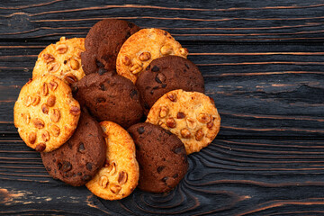 Mix of cookies chocolate and peanut . Many unhealthy snacks .