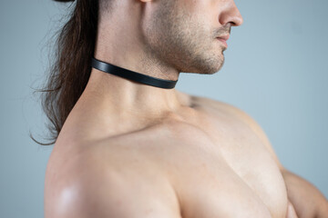 muscular sexy with naked torso in bdsm leather collar or choker, dominant sex role play games with...