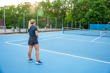Fototapeta premium Professional tennis players playing the tennis on outside court