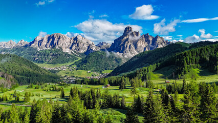 Panoramic view of Sassongher mountain and Corvara golf course 