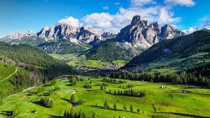 Panoramic view of Sassongher mountain and Corvara golf course 