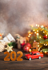 Wooden numbers 2025, toy car carries the number 5