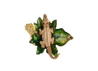 gold jewelry crocodile brooch isolated on white background
