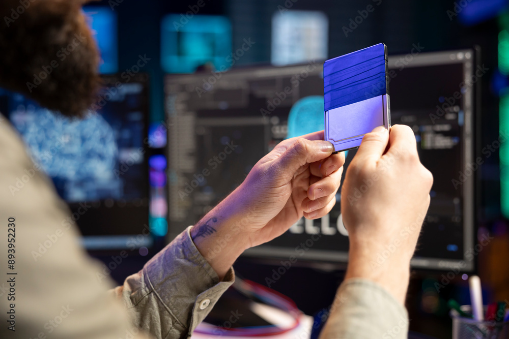 Poster computer scientist holding disk containing artificial intelligence entity, close up shot. it profess