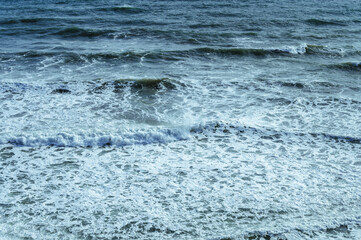 Foam waves on the sea