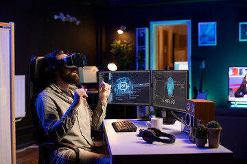 IT expert using virtual reality to make artificial intelligence become sentient, receiving hello...
