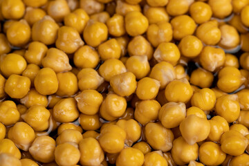 chickpeas porridge with honey during cooking