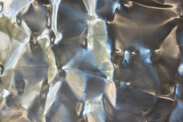 Crinkled Metallic Texture Background merges art with design, creating a futuristic surface