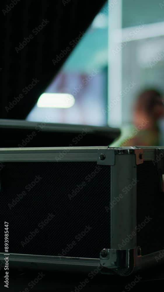 Poster vertical video military personnel in a high tech control room gathers intelligence for data integrat