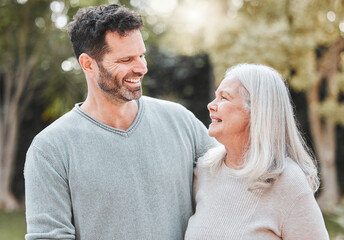 Hug, man and senior mom in garden with smile, gratitude and care with outdoor bonding together. Love, elderly mother and adult son in backyard with embrace, support and happy family laughing in park