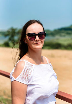 portrait of 36 years old russian woman in sunglasses on the summer day