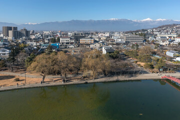 Matsumoto, Japan - December 25, 2023: Aerial view of Matsumoto city center, one of the Japanese...