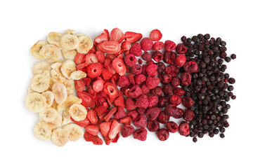Composition with different freeze-dried fruits and berries on white background