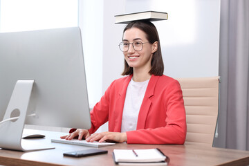 Woman with good posture working in office