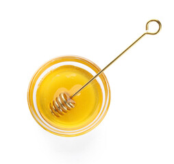 Bowl of sweet honey with dipper on white background
