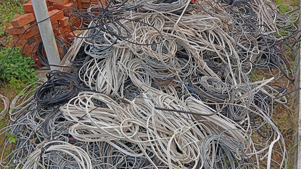A tangle of discarded electrical cables, awaiting recycling