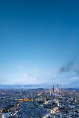 Stunning Aerial View of a Bustling Cityscape at Dusk