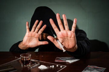 Stop drugs concept. A man makes a stop drug gesture, Human hand stops drugs, Against Drug Abuse