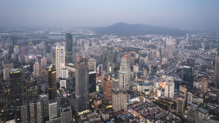 Stunning Aerial View of a Bustling Urban Cityscape at Dusk