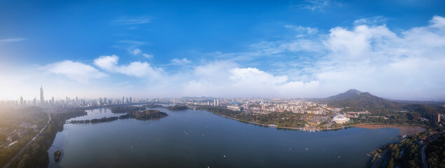 Breathtaking Panoramic View of City and Serene Lake Landscape