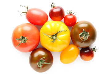 Different fresh tomatoes on white background