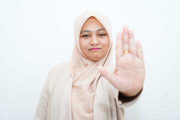A beautiful woman is giving instructions and symbols with her fingers