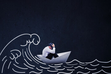 Scared businessman sitting on the paper boat while sailing on the stormy sea