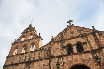 Facade of the Santa Lucia de Guane Sanctuary, catholic stone colonial temple of Guane, Santander, Colombia 