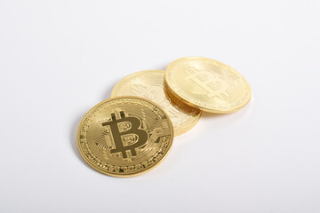 Bitcoin isolated on white background. Cryptocurrency. Group of Golden bitcoin physical gold coin. Symbol of the crypto currency