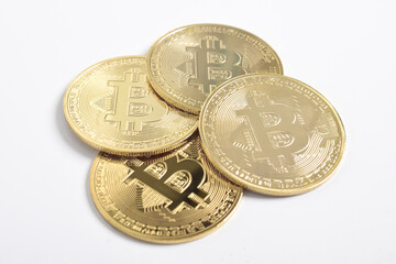Bitcoin isolated on white background. Cryptocurrency. Group of Golden bitcoin physical gold coin. Symbol of the crypto currency
