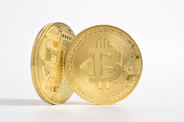 Bitcoin isolated on white background. Cryptocurrency. Golden bitcoin physical gold coin. Symbol of the crypto currency