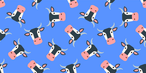 cartoon cow heads on blue  background seamless pattern print design vector illustration