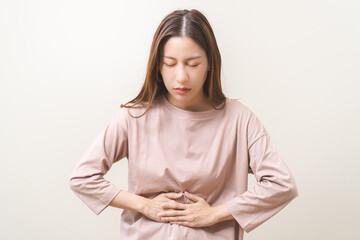 Flatulence asian young woman intolerance hand in stomach ache, suffer from food poisoning,...