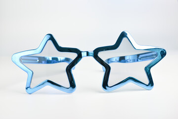 blue star shape of glasses on white background