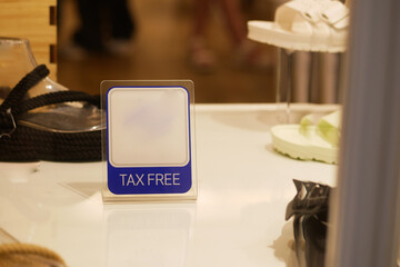 shop tax free text duty free shop sign on shop window 