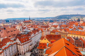 Naklejka premium View of the city of Prague and old town square with buildings and Church of Our Lady before Tyn in the stare mesto from platform of Old Town Hall (Staromestska Radnice)