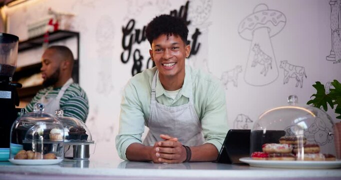 Happy man, barista and friendly waiter at cafe for customer service, career or startup at coffee shop. Portrait of confident male person or small business owner smile for management at restaurant