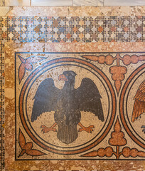 Mosaic with eagle on the floor of San Marco basilica in Venice