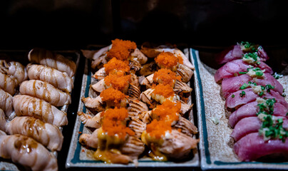 Varieties of sashimi buffet ready to eat serving in the restuarant for clients