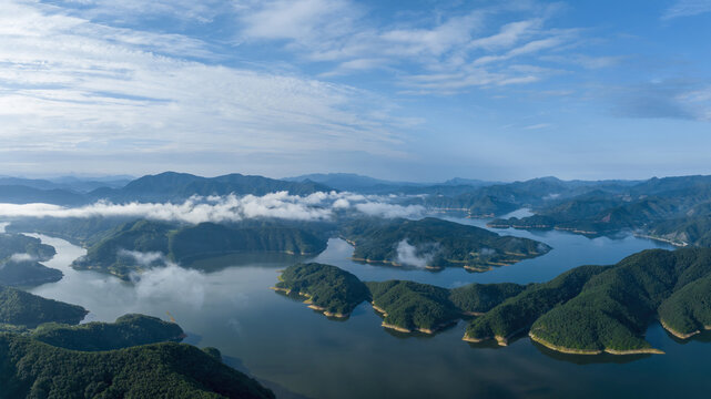 Aerial view of summer view of Yongdamho Lake with sea of clouds and on mountain at Wolgye-ri near Jinan-gun, South Korea
