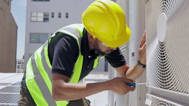 Air conditioning, roof and technician man repair, maintenance and working on fan or aircon power generator. Electrician person, handyman or contractor tools, screwdriver and industry labor services
