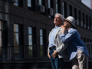 Mature couple walking around the city and sightseeing. 