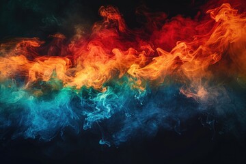 Fototapeta premium Multicolored smoke in dynamic pattern against a dark background