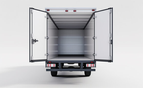 Empty open back of a delivery truck facing forward with doors wide open.